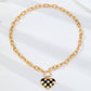 Checkered Heart Toggle Necklace | 80N93046